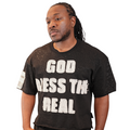 Man wearing a black t-shirt with text on a white background. God Bless The Real